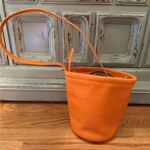 Mini orange bucket bag
